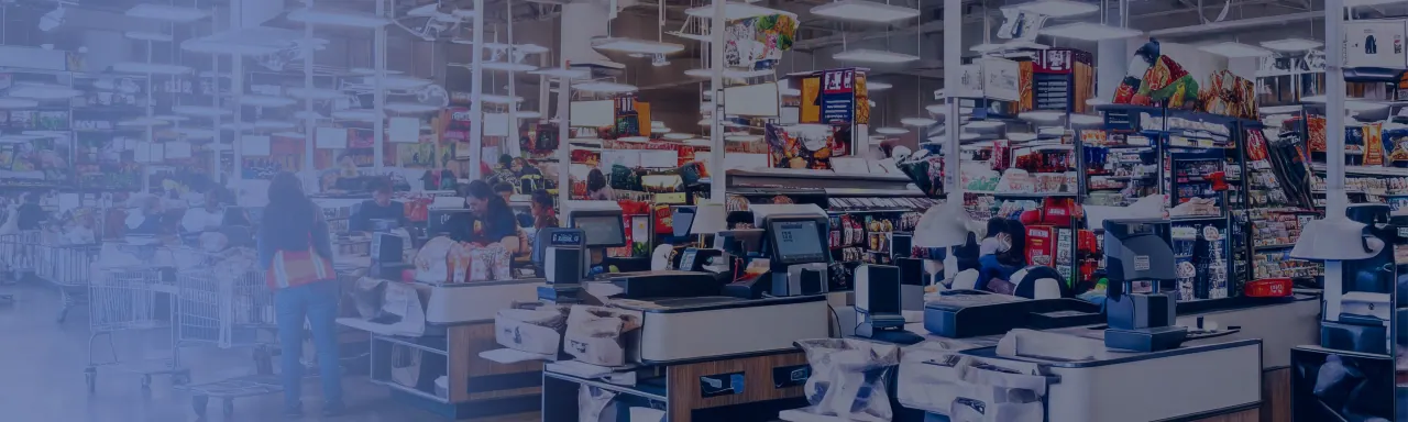 Busy retail chain checkout and grocery store interior